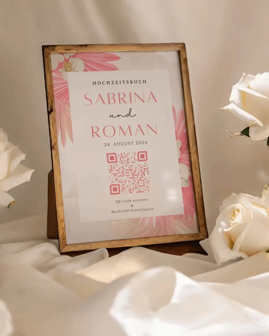 Elegant wedding guest book with QR code to collect photos, adorned with roses, enhancing your special day.